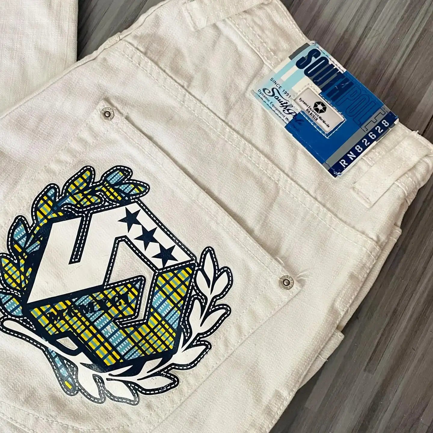 Moda americana 2025 Southpole New Y2k Branco Homens Estampado Jeans Gótico Retro Calças Soltas Calças Largas Casuais de Rua Calça Jeans Casal
