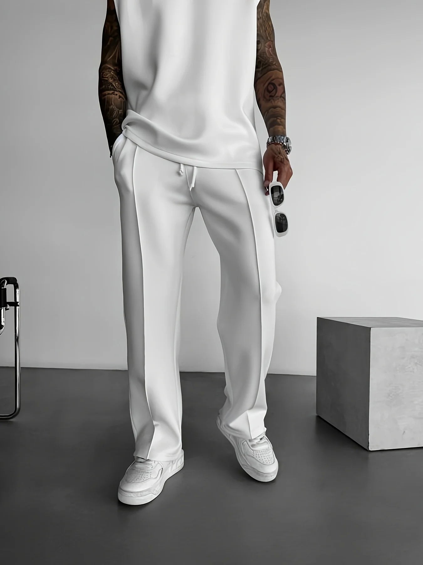 2025 Verão novo masculino moda esportiva calças casuais colete conjunto solto sem mangas T-shirt conjunto de cor sólida