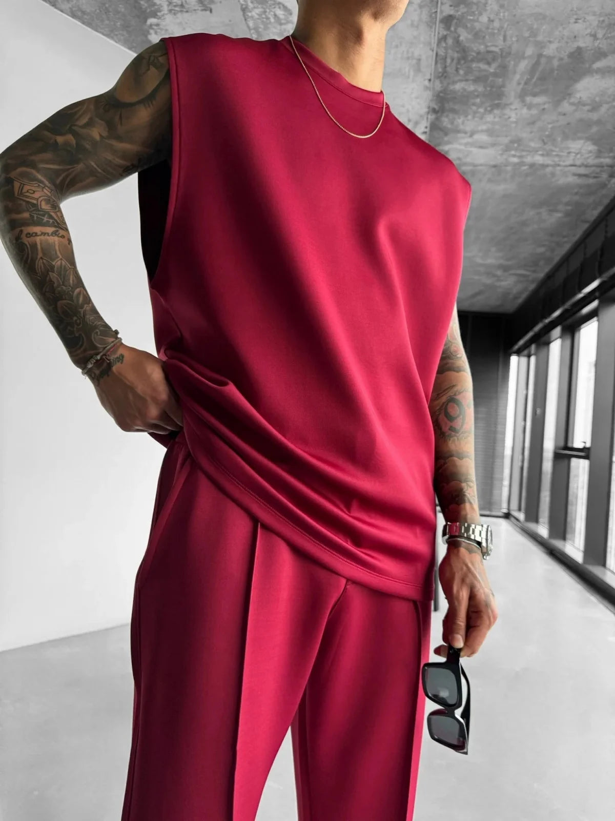 2025 Verão novo masculino moda esportiva calças casuais colete conjunto solto sem mangas T-shirt conjunto de cor sólida