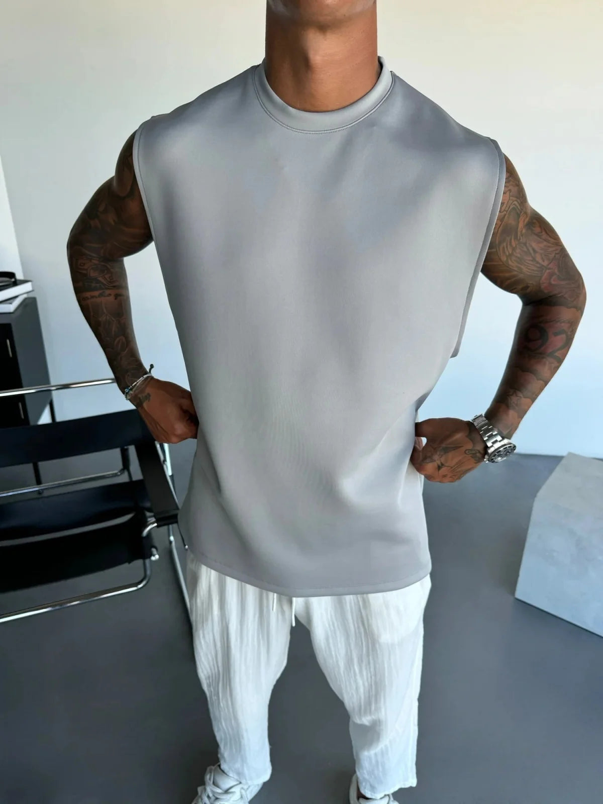 2025 Verão novo masculino moda esportiva calças casuais colete conjunto solto sem mangas T-shirt conjunto de cor sólida
