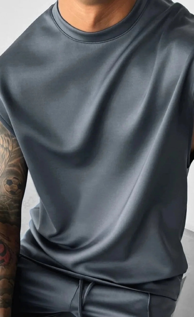 2025 Verão novo masculino moda esportiva calças casuais colete conjunto solto sem mangas T-shirt conjunto de cor sólida