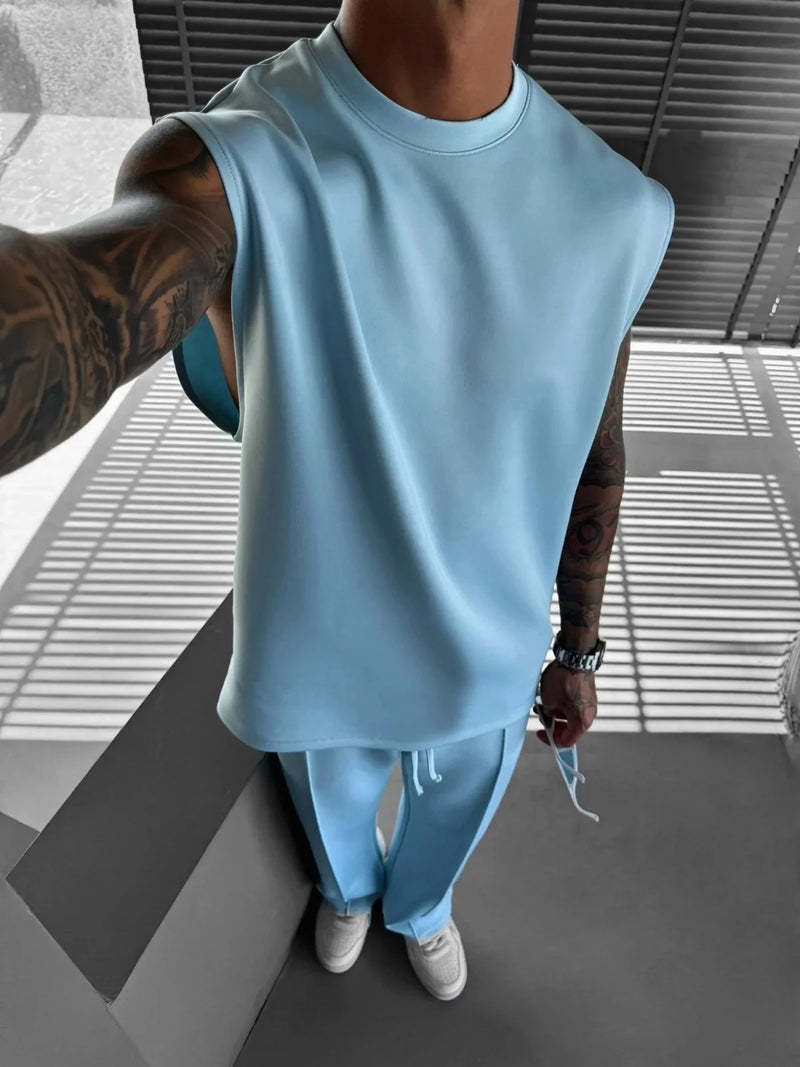 2025 Verão novo masculino moda esportiva calças casuais colete conjunto solto sem mangas T-shirt conjunto de cor sólida