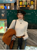 Suéter de gola alta feminino inverno 2025 vermelho retrô com forro de veludo engrossado desgaste interno tricô térmico camisa de assentamento