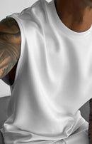 2025 Verão novo masculino moda esportiva calças casuais colete conjunto solto sem mangas T-shirt conjunto de cor sólida