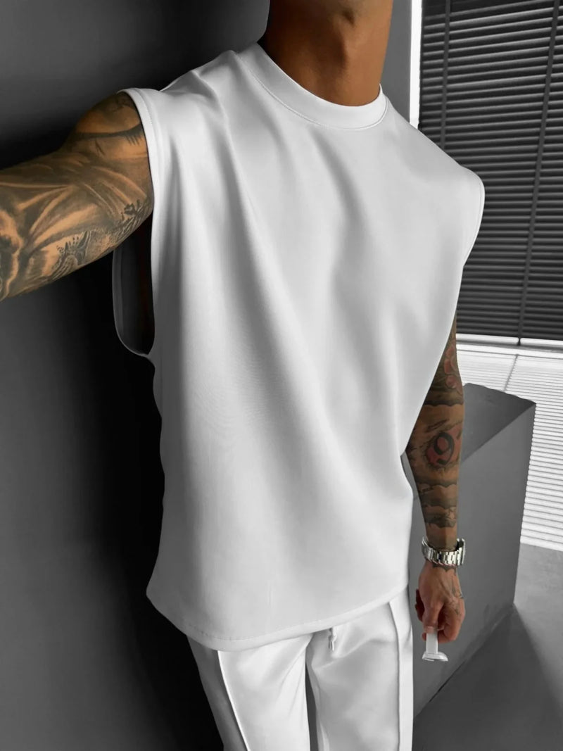 2025 Verão novo masculino moda esportiva calças casuais colete conjunto solto sem mangas T-shirt conjunto de cor sólida