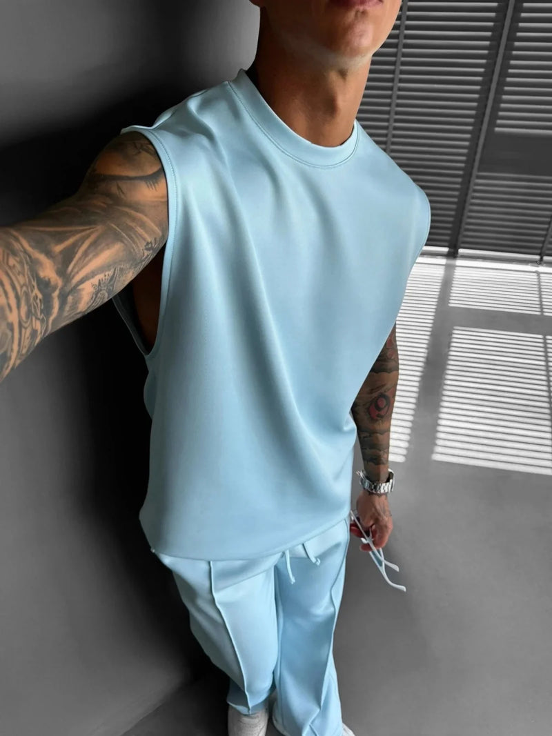 2025 Verão novo masculino moda esportiva calças casuais colete conjunto solto sem mangas T-shirt conjunto de cor sólida