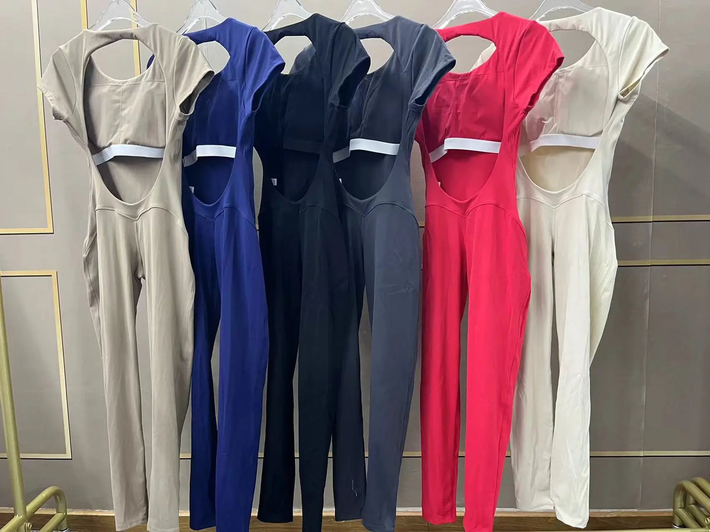 Sexy Mangas Compridas Terno Feminino Macacão Secagem Rápida Roupas de Ioga Treino Bodysuits Backless Esportes Macacão Mulheres Ginásio