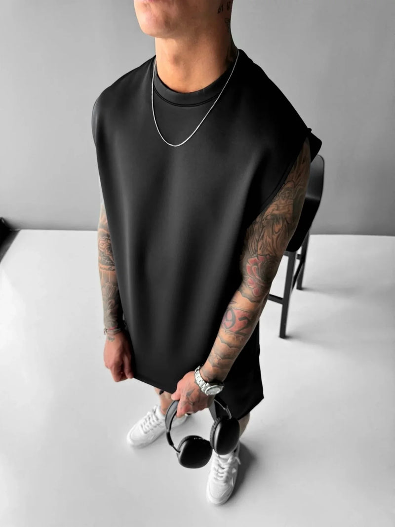 2025 Verão novo masculino moda esportiva calças casuais colete conjunto solto sem mangas T-shirt conjunto de cor sólida