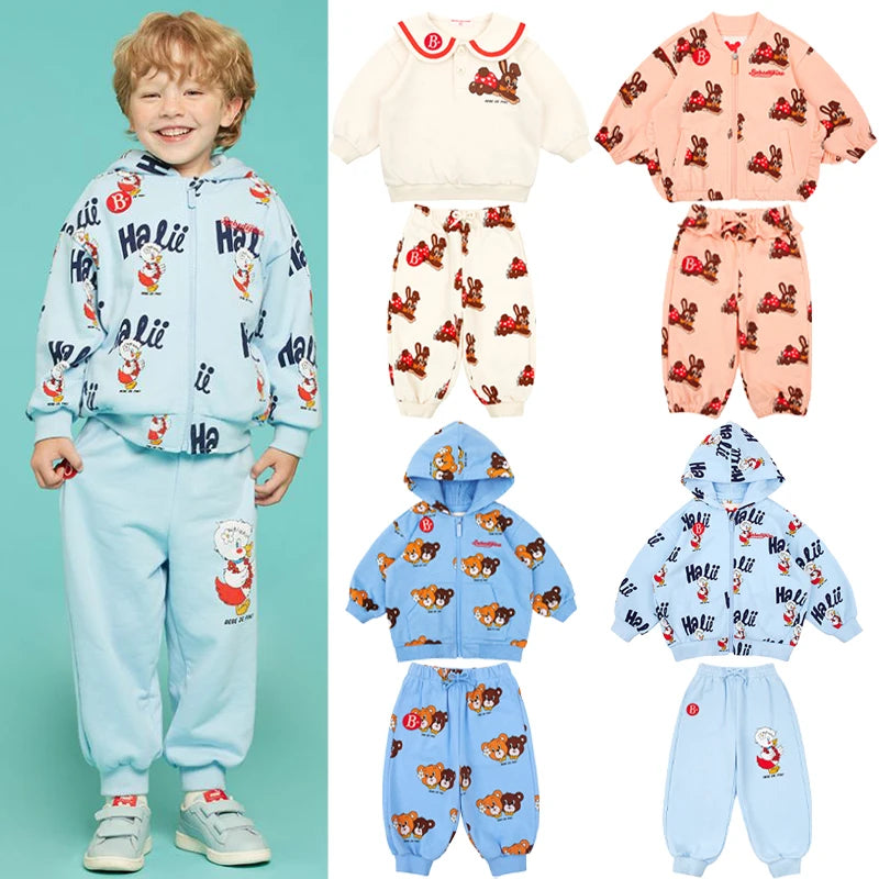 Conjunto de roupas infantis 2025 Nova Primavera Outono Meninos Meninas Cartoon Impresso Com Capuz Conjunto de Calças Casuais Crianças Roupas Casuais Sólidas