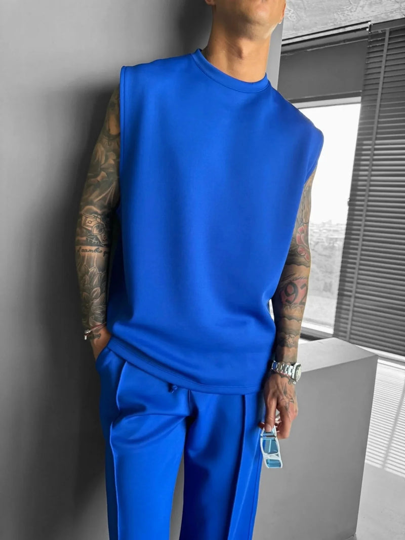 2025 Verão novo masculino moda esportiva calças casuais colete conjunto solto sem mangas T-shirt conjunto de cor sólida