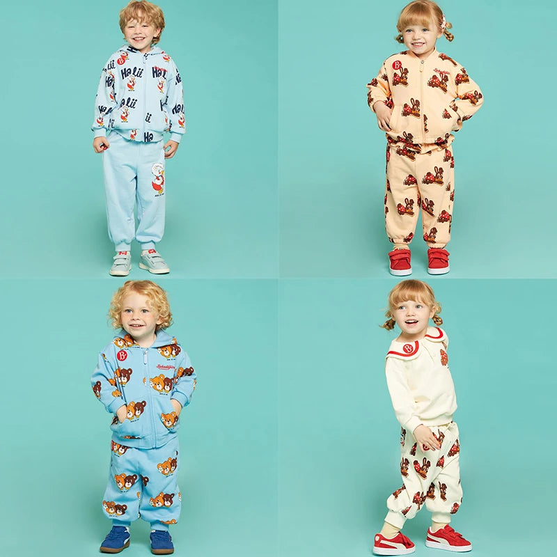 Conjunto de roupas infantis 2025 Nova Primavera Outono Meninos Meninas Cartoon Impresso Com Capuz Conjunto de Calças Casuais Crianças Roupas Casuais Sólidas