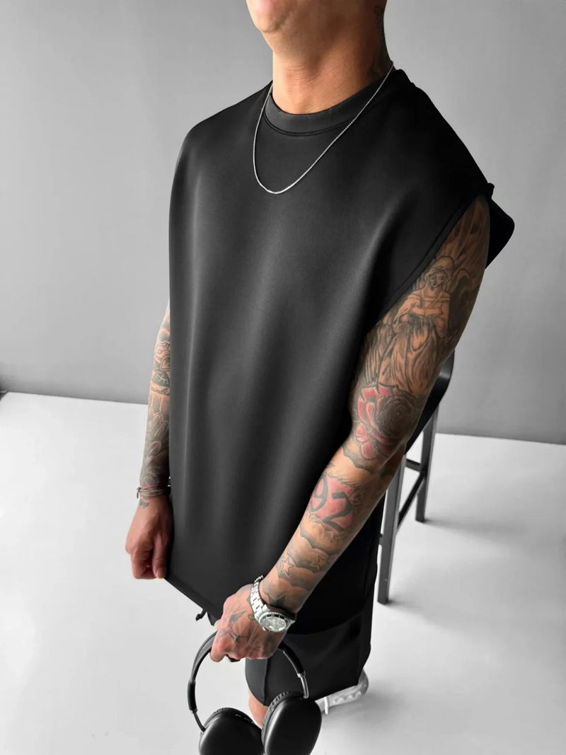 2025 Verão novo masculino moda esportiva calças casuais colete conjunto solto sem mangas T-shirt conjunto de cor sólida