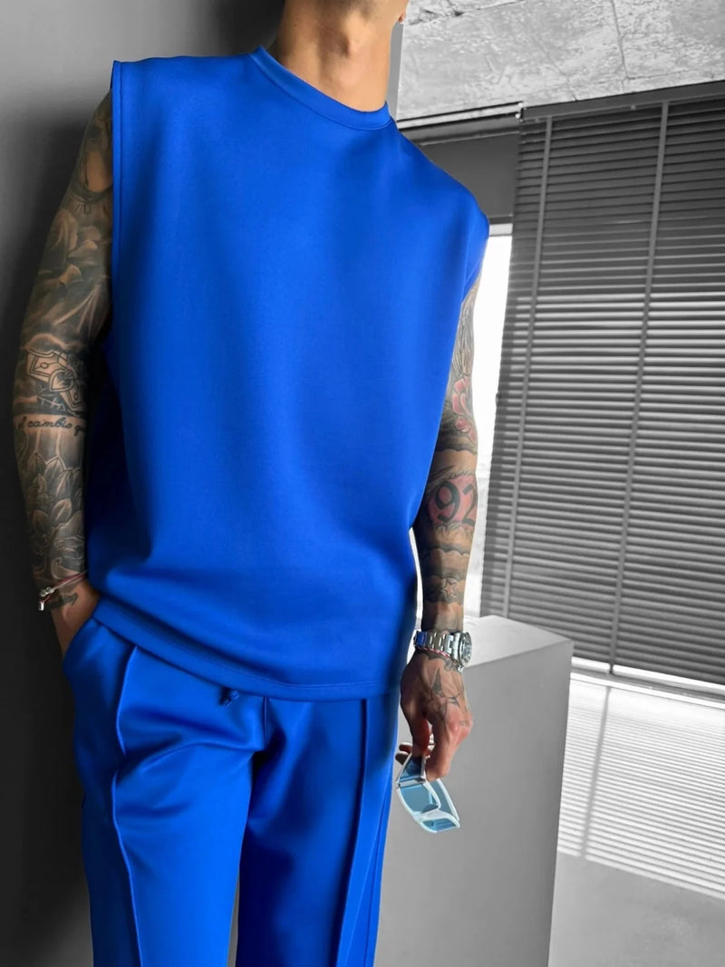 2025 Verão novo masculino moda esportiva calças casuais colete conjunto solto sem mangas T-shirt conjunto de cor sólida