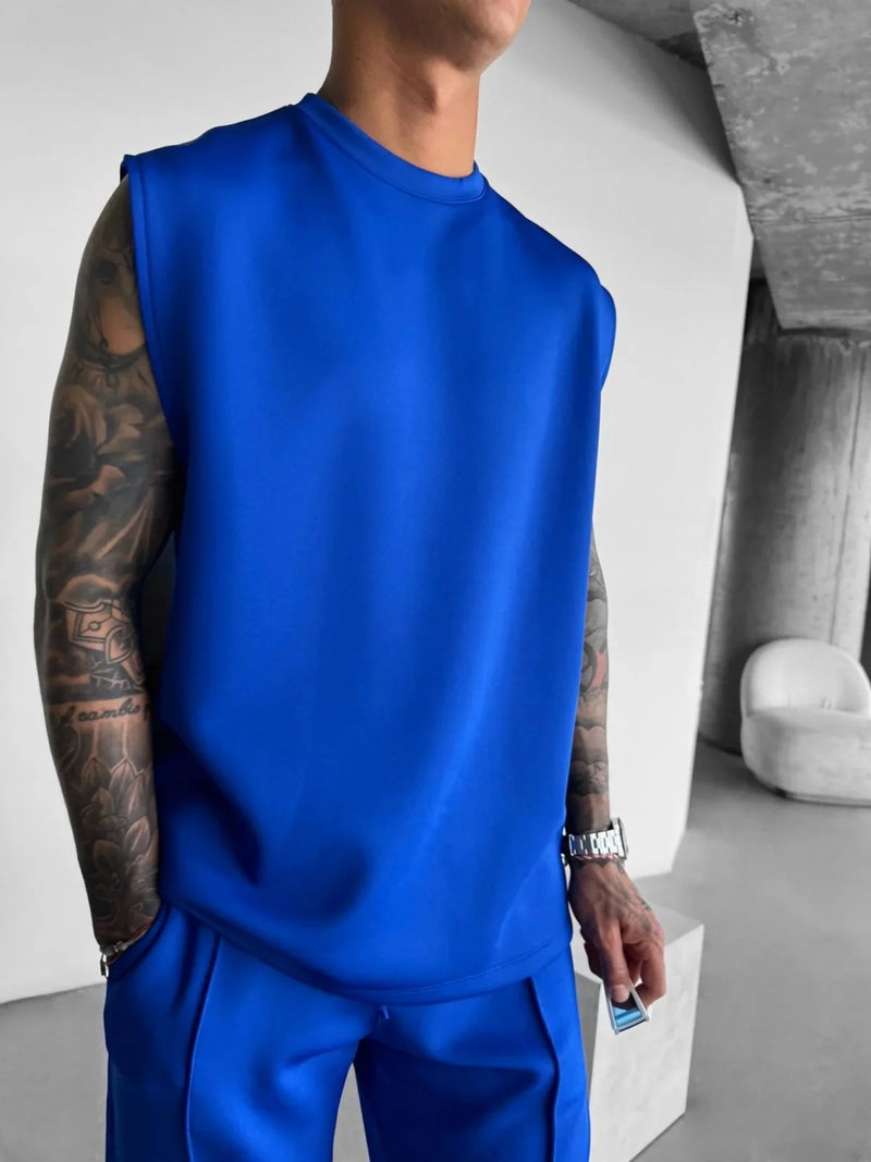 2025 Verão novo masculino moda esportiva calças casuais colete conjunto solto sem mangas T-shirt conjunto de cor sólida